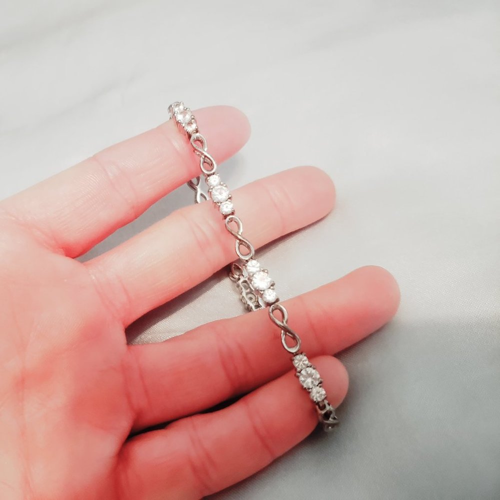 7" Infinity link and clear stone tennis bracelet Claw clasp timeless jewelry